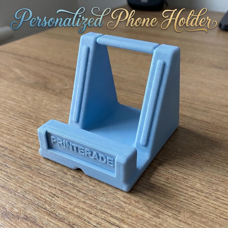 Personalized 3D printed phone stand with custom name plate by Printerade